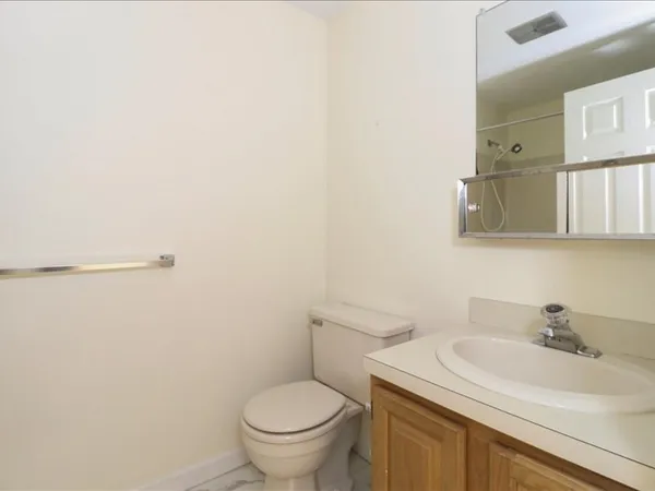 a bathroom with a sink and a toilet