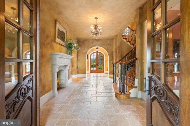 a view of a hallway with washer and dryer