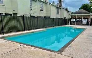 a view of a backyard with a patio