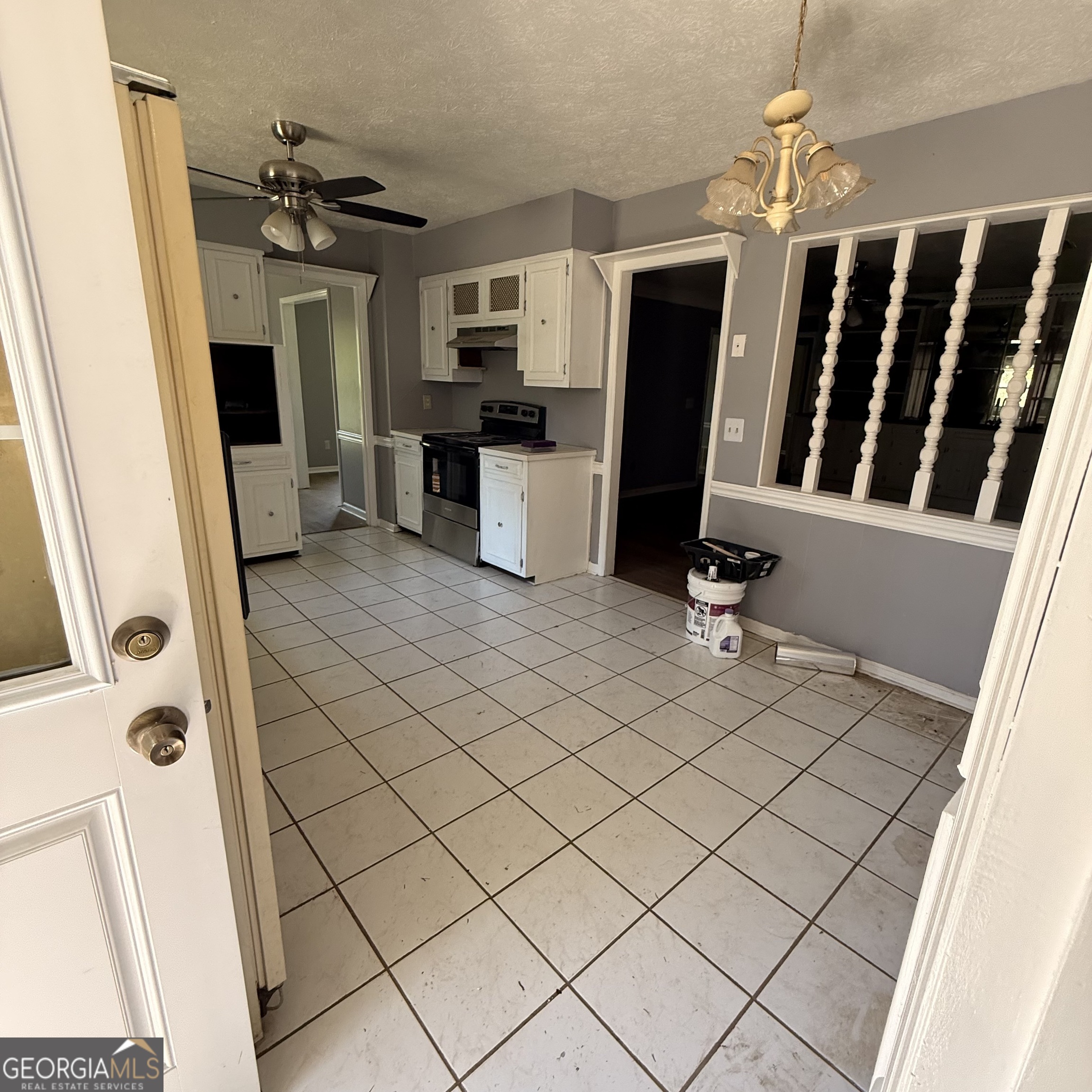 6282 Starlight Drive Columbus, GA 31909 - Photo 2 of 19 a view of a kitchen with fridge and wooden floor