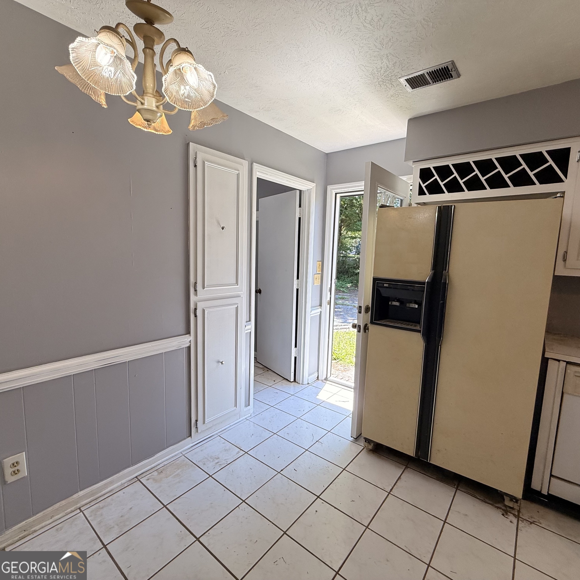 6282 Starlight Drive Columbus, GA 31909 - Photo 8 of 19 a view of kitchen and utility room