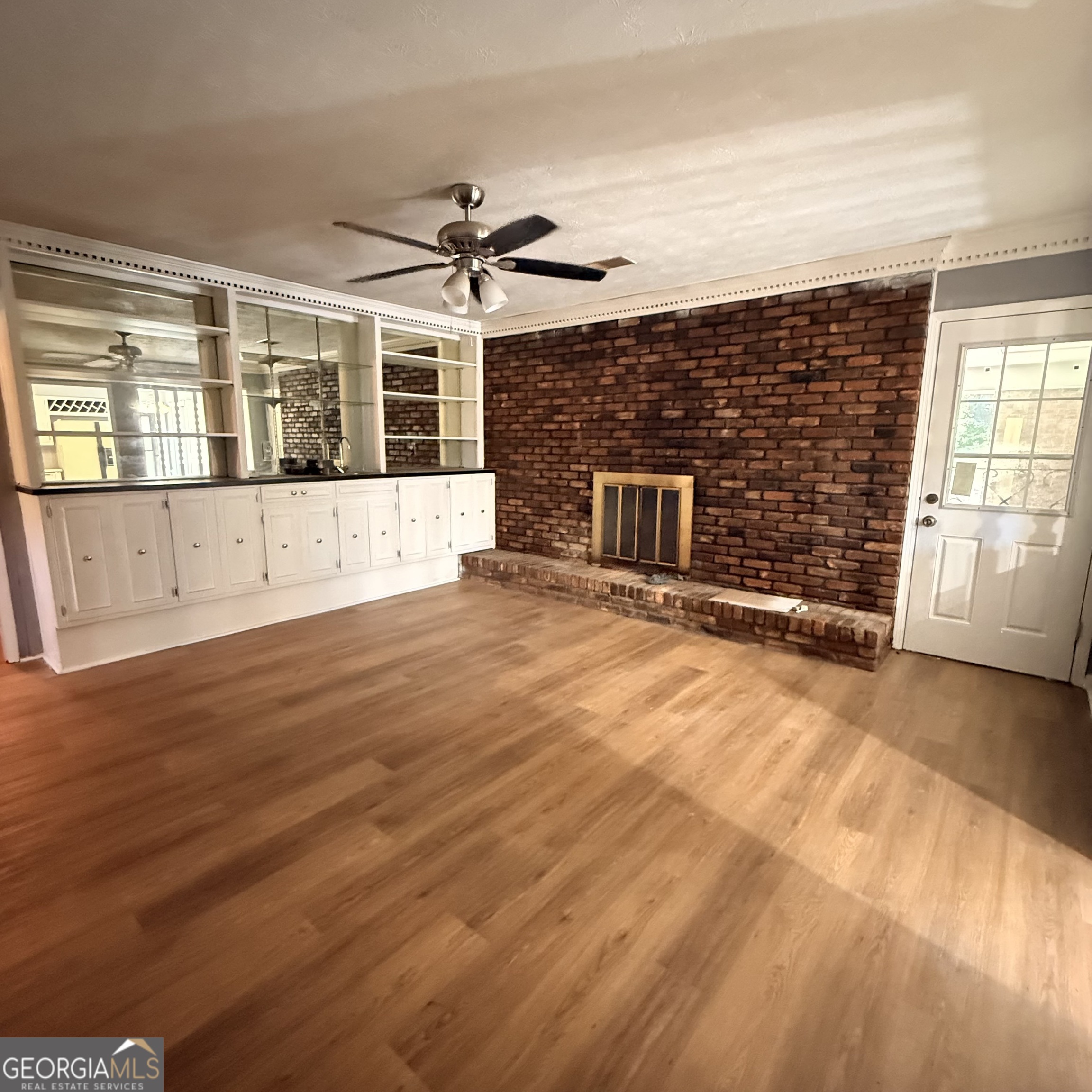 6282 Starlight Drive Columbus, GA 31909 - Photo 10 of 19 a view of a livingroom with a furniture wooden floor and window