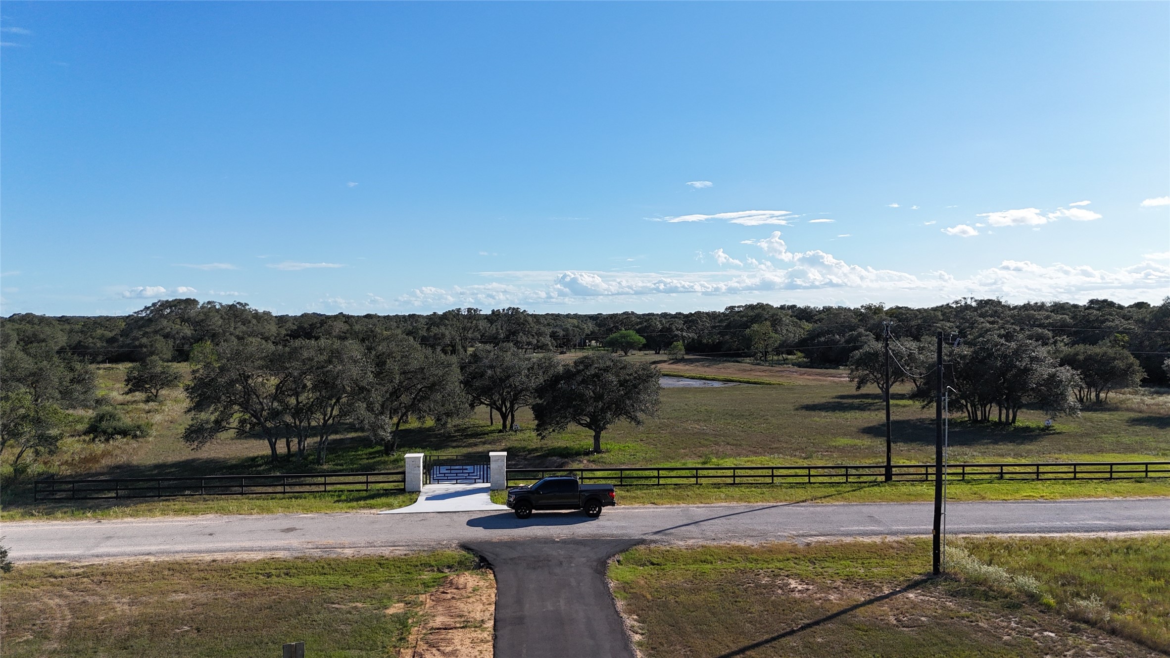 0 Gadwall Lane Columbus, TX 78934 - Photo 13 of 17 a view of a lake with a mountain in the back