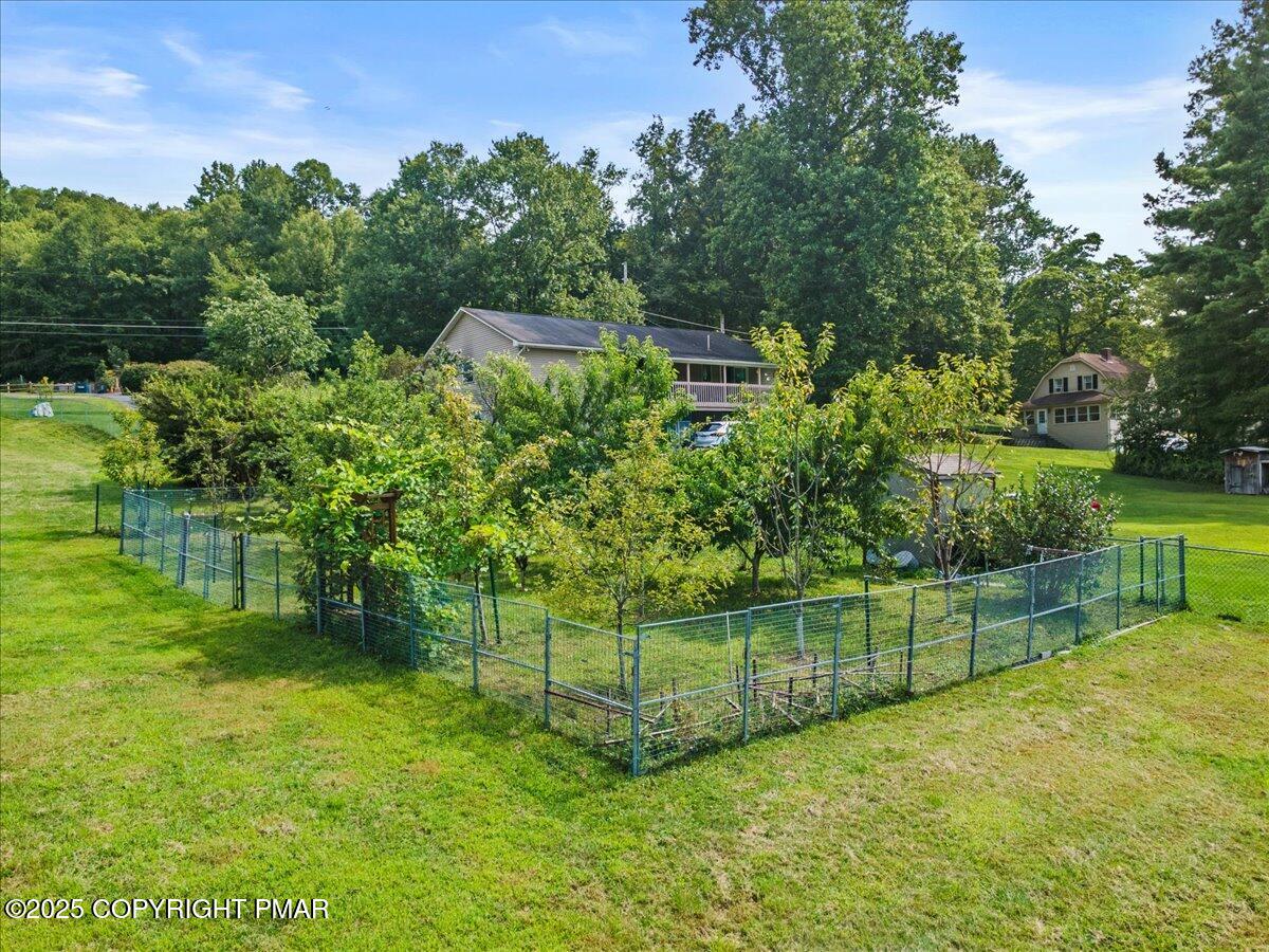 1553 Middle Road Stroudsburg, PA 18360 - Photo 14 of 75 a view of a backyard with a garden