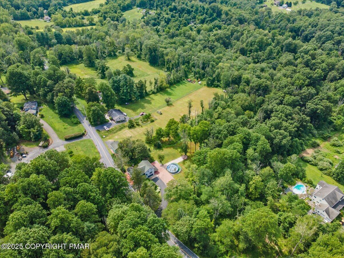 1553 Middle Road Stroudsburg, PA 18360 - Photo 20 of 75 an aerial view of residential house with outdoor space and trees all around