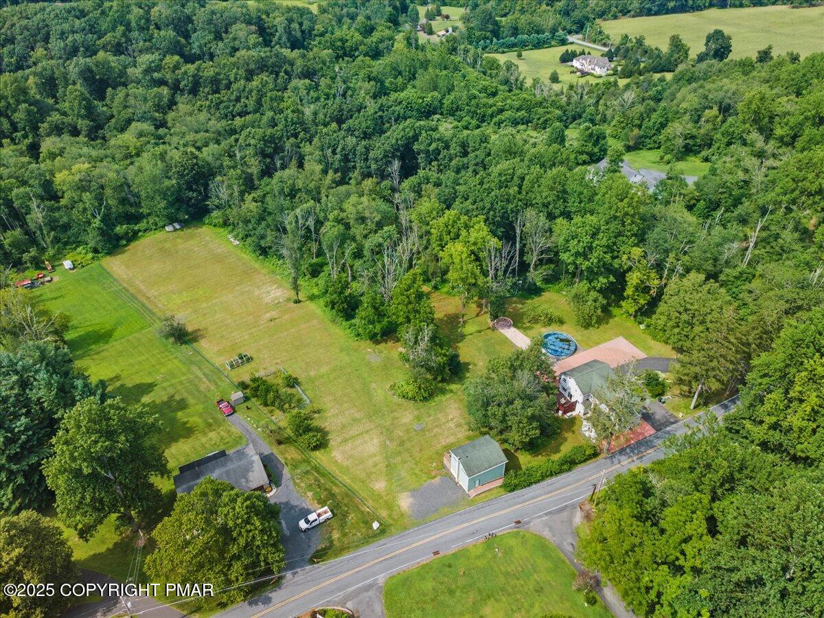 1553 Middle Road Stroudsburg, PA 18360 - Photo 21 of 75 an aerial view of residential house with outdoor space and trees all around