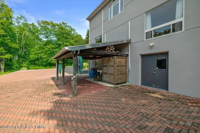 a view of a backyard with water fountain