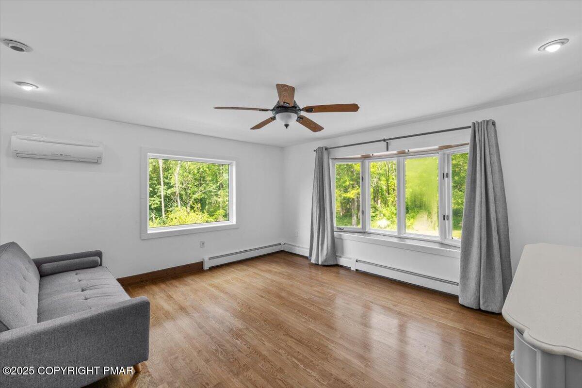 1553 Middle Road Stroudsburg, PA 18360 - Photo 34 of 75 a view of livingroom with furniture ceiling fan and window