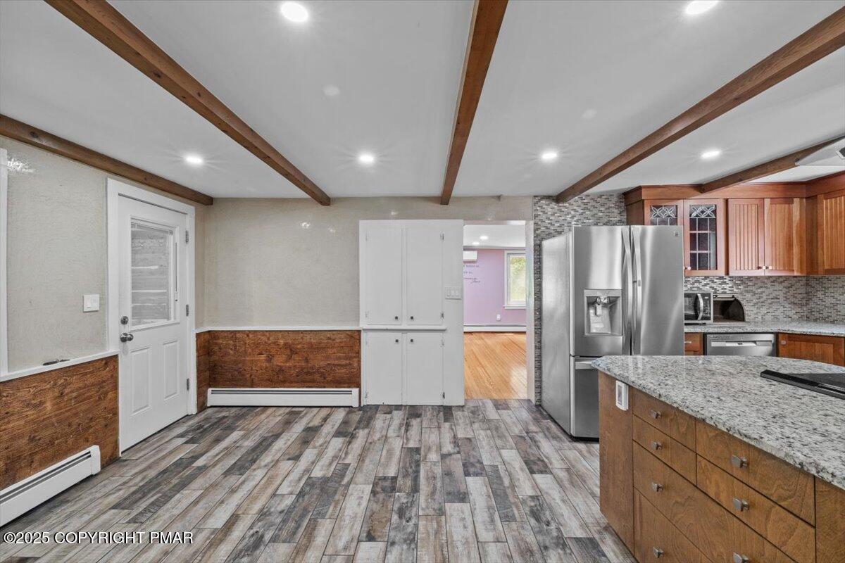 1553 Middle Road Stroudsburg, PA 18360 - Photo 37 of 75 a kitchen with stainless steel appliances granite countertop a refrigerator and a stove top oven