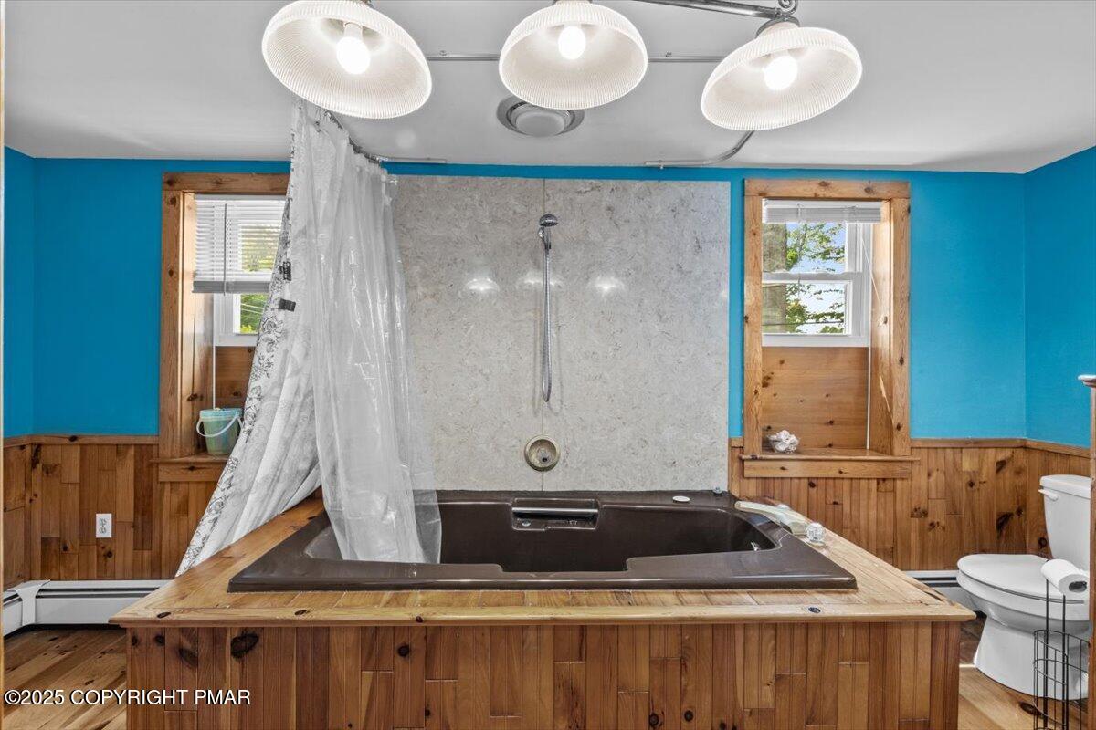 1553 Middle Road Stroudsburg, PA 18360 - Photo 40 of 75 a bathroom with a sink a mirror and a toilet