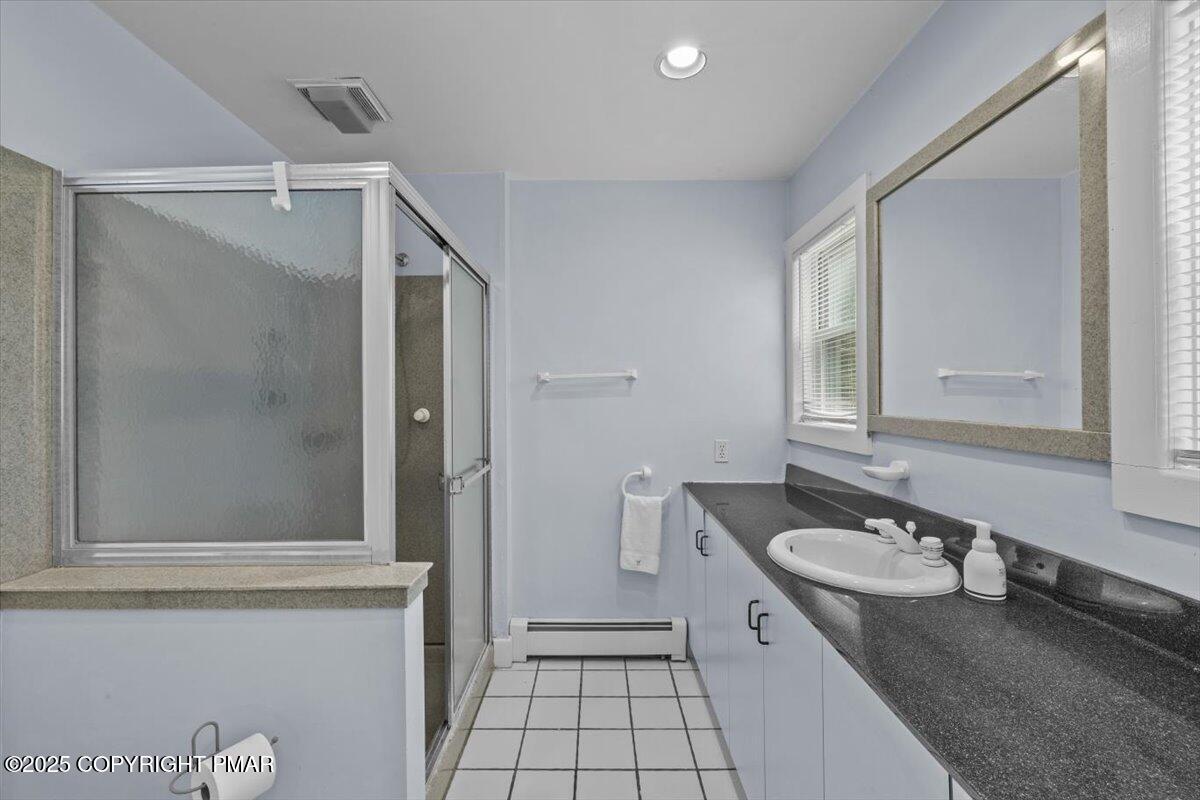 1553 Middle Road Stroudsburg, PA 18360 - Photo 46 of 75 a bathroom with a granite countertop sink mirror and double