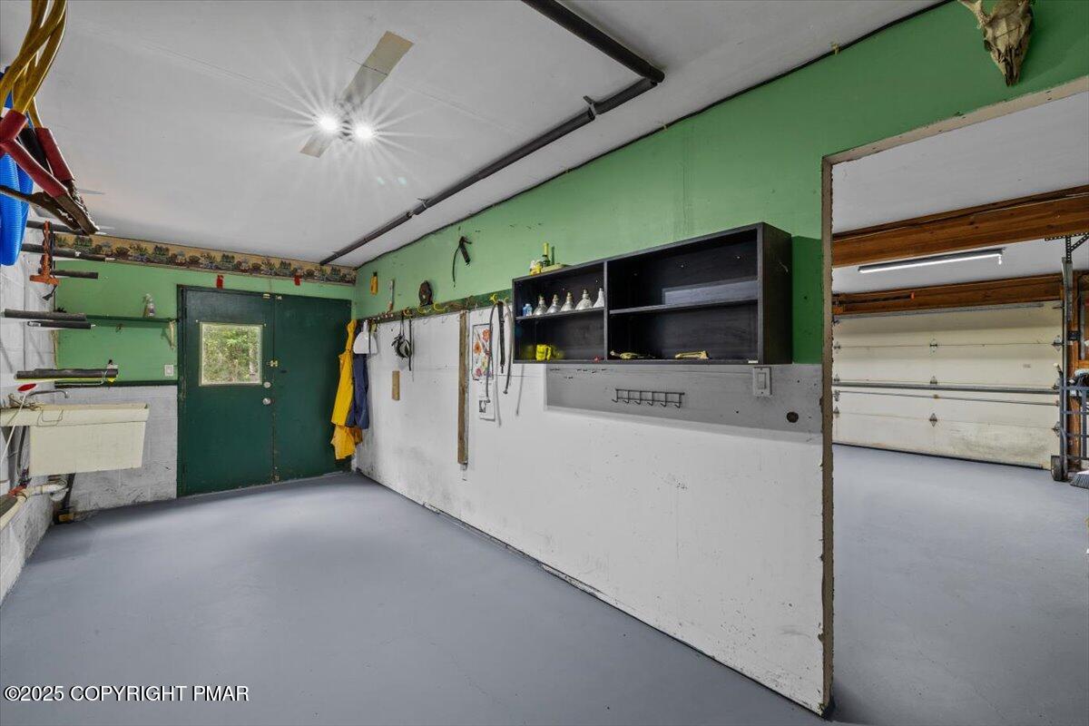 1553 Middle Road Stroudsburg, PA 18360 - Photo 55 of 75 a view of a livingroom with furniture and a ceiling fan