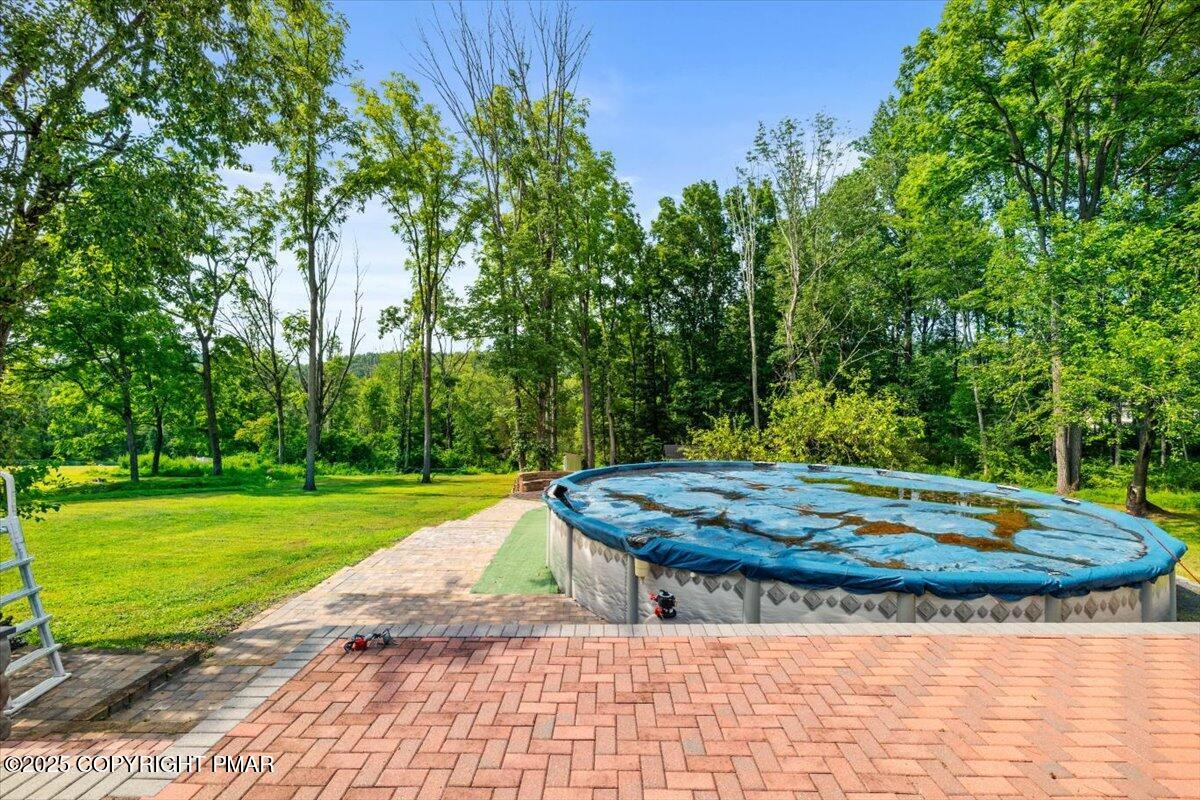 1553 Middle Road Stroudsburg, PA 18360 - Photo 7 of 75 a view of a backyard with water fountain