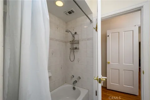 a bathroom with a bath tub