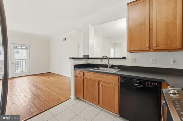 a view of kitchen and wooden floor
