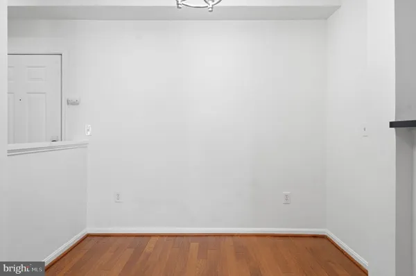 a view of kitchen with wooden floor