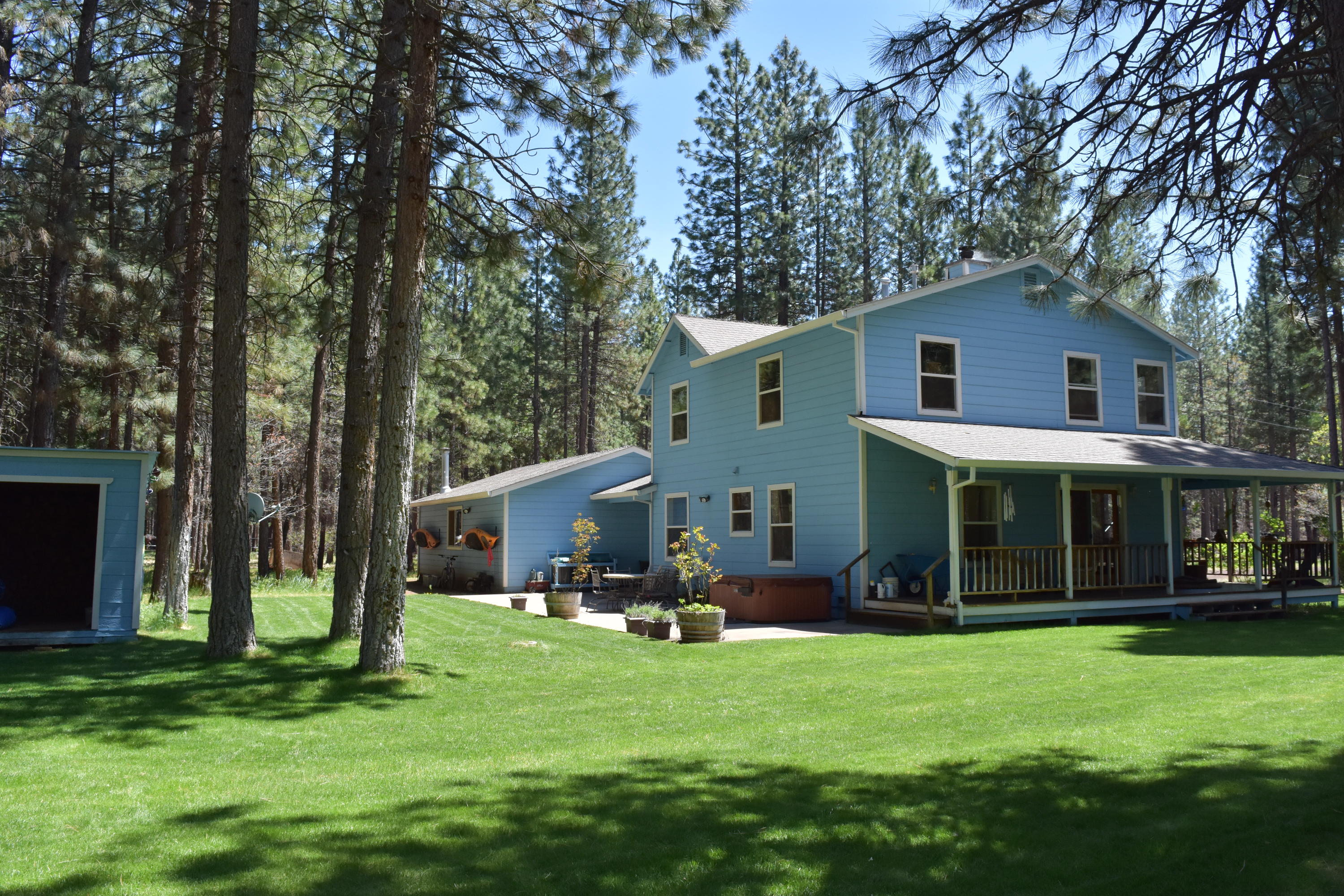 50 Red Rock Road McArthur, CA 96056 - Photo 1 of 24 a view of a house with a yard and sitting area