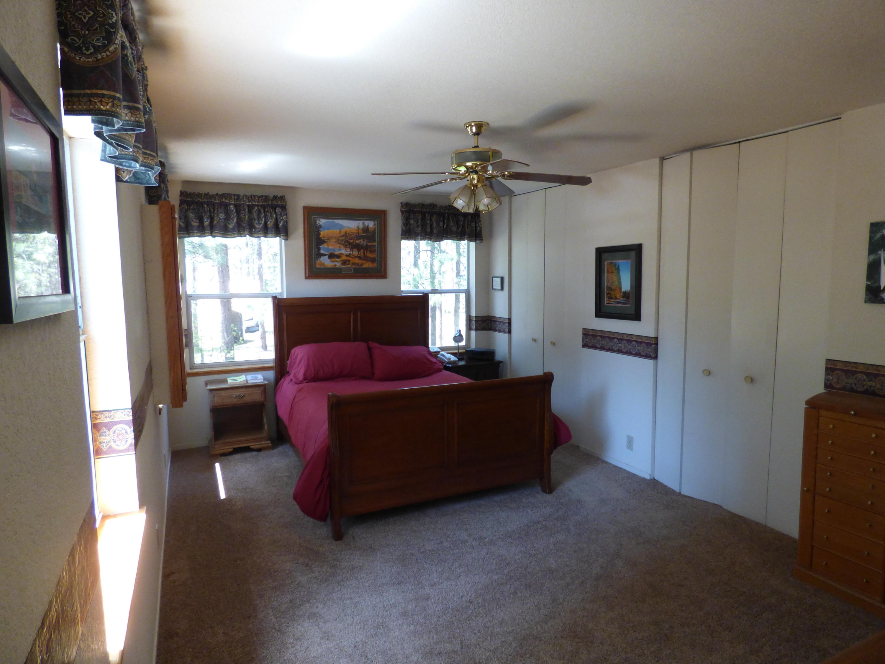 50 Red Rock Road McArthur, CA 96056 - Photo 11 of 24 a living room with furniture and a window