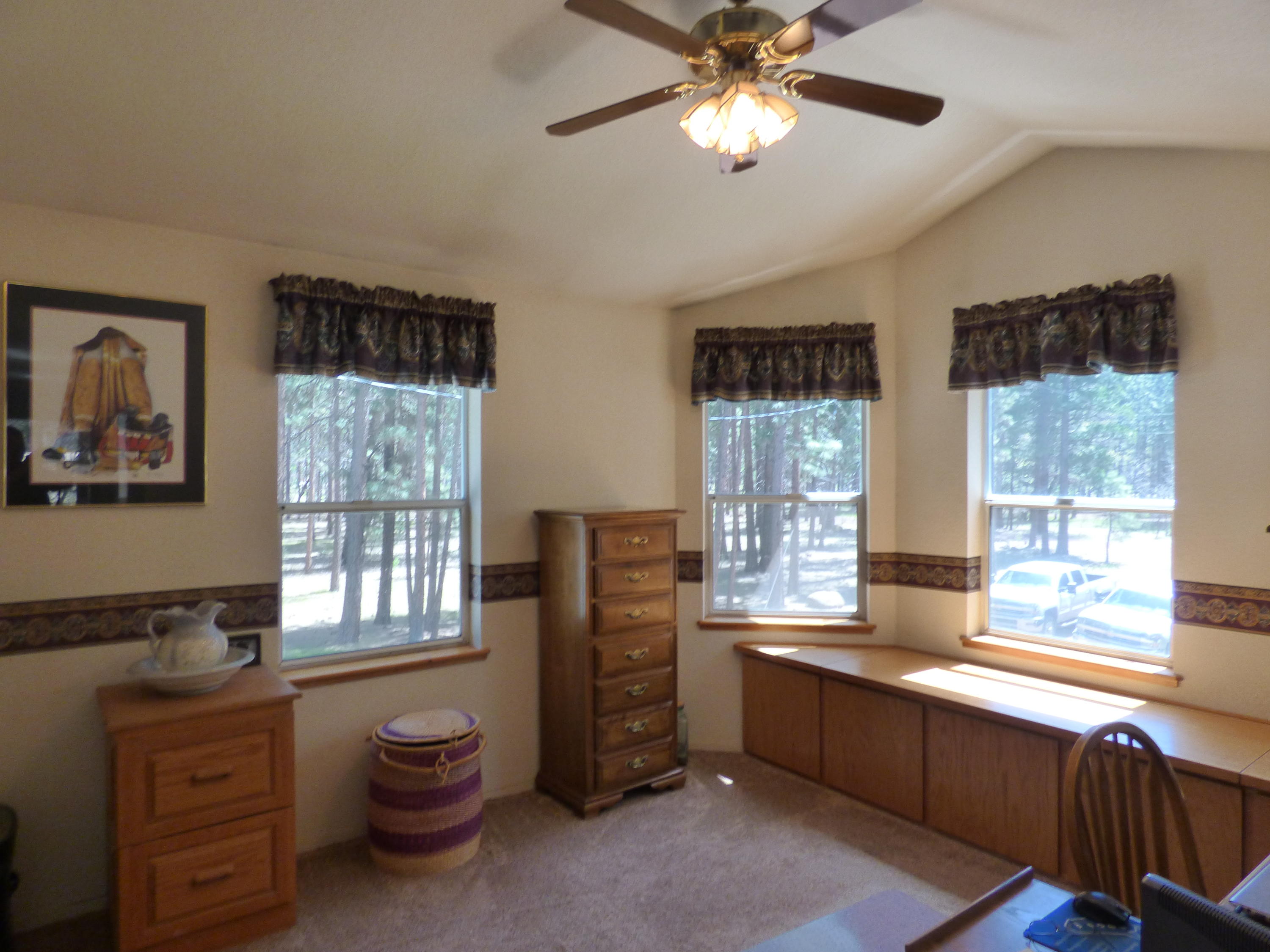 50 Red Rock Road McArthur, CA 96056 - Photo 12 of 24 a living room with furniture and windows