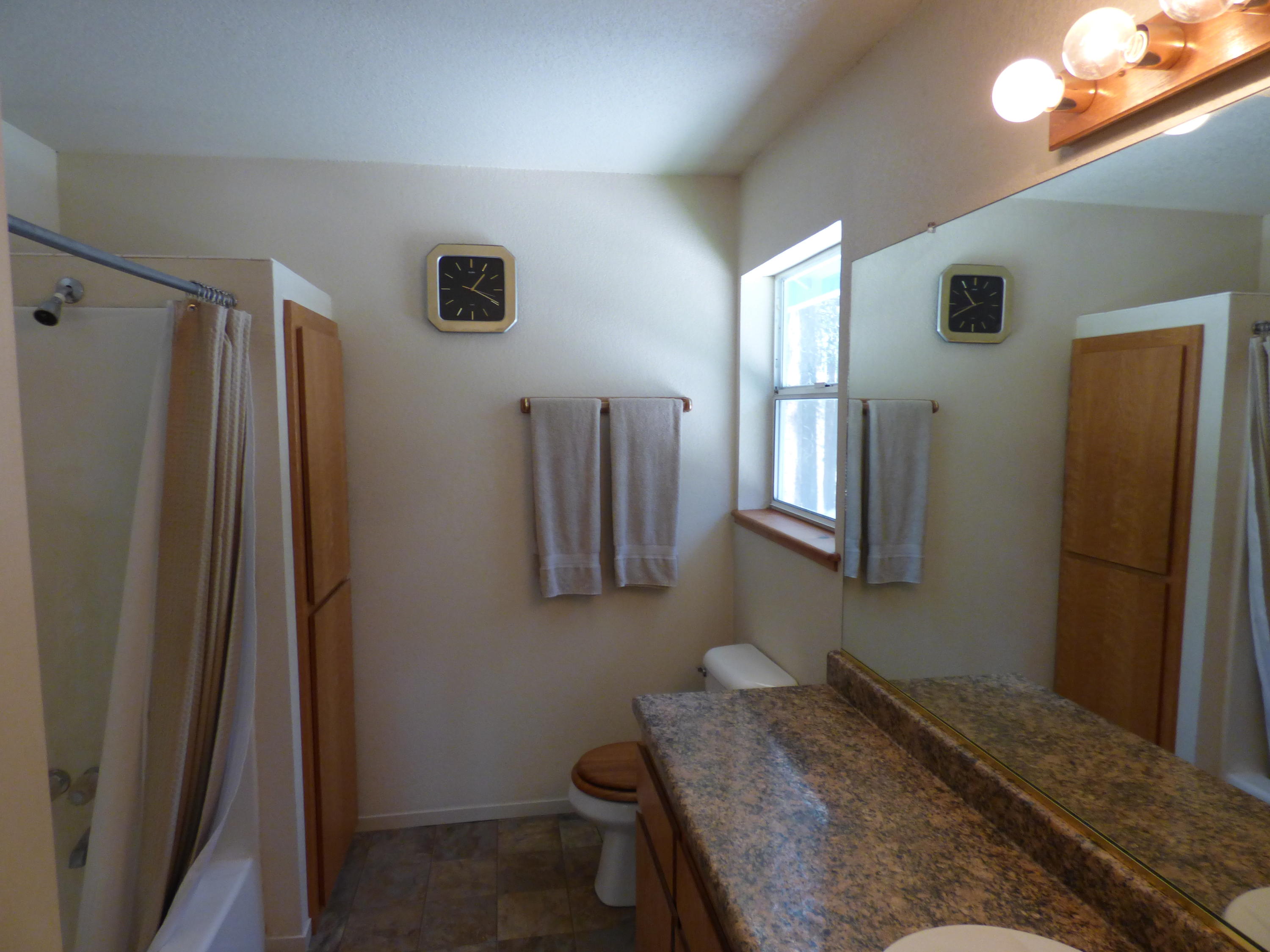 50 Red Rock Road McArthur, CA 96056 - Photo 13 of 24 a bedroom with a bed and a window