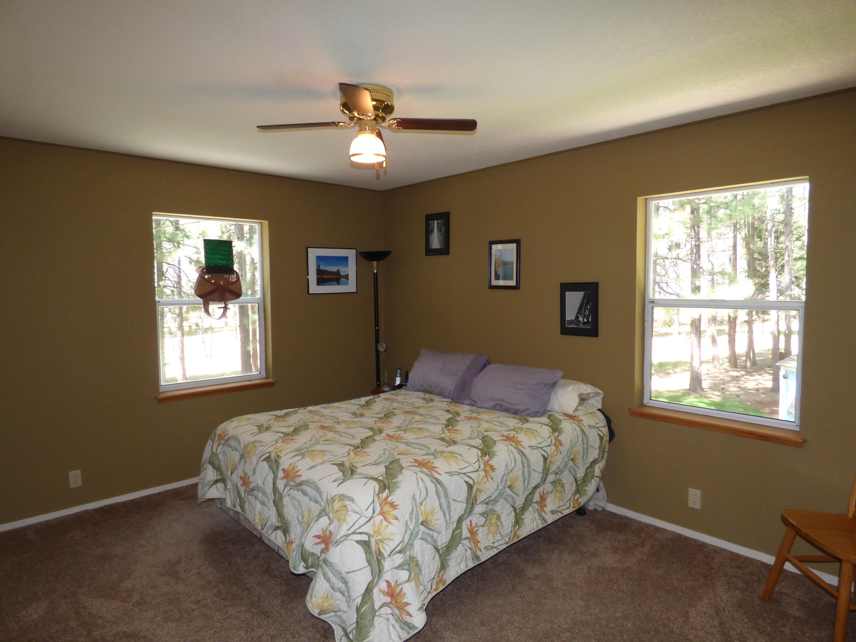 50 Red Rock Road McArthur, CA 96056 - Photo 14 of 24 a bedroom with a bed and window