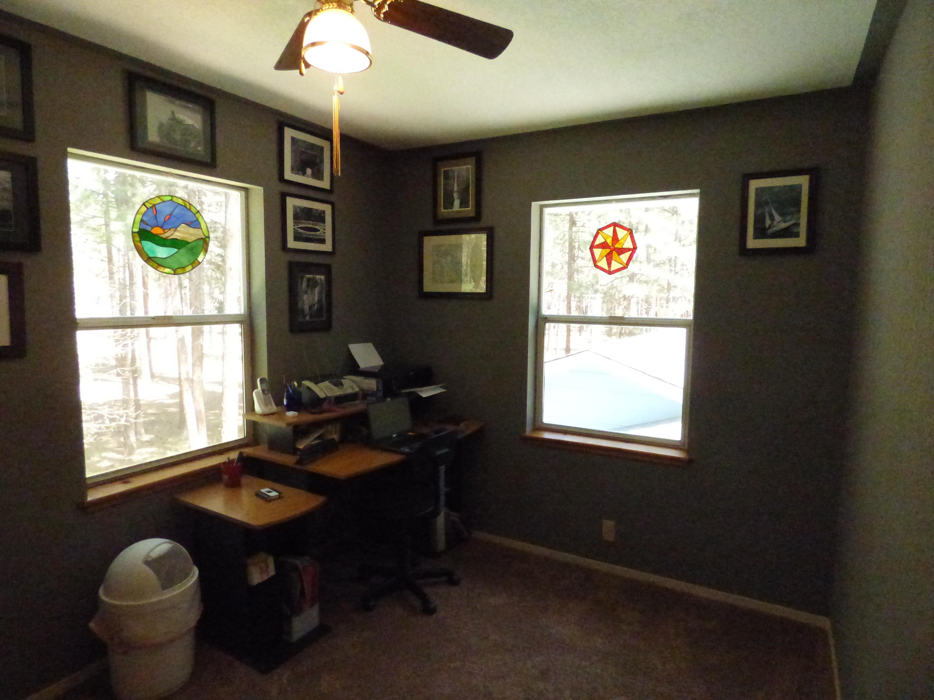 50 Red Rock Road McArthur, CA 96056 - Photo 15 of 24 a view of a workspace with furniture and a window