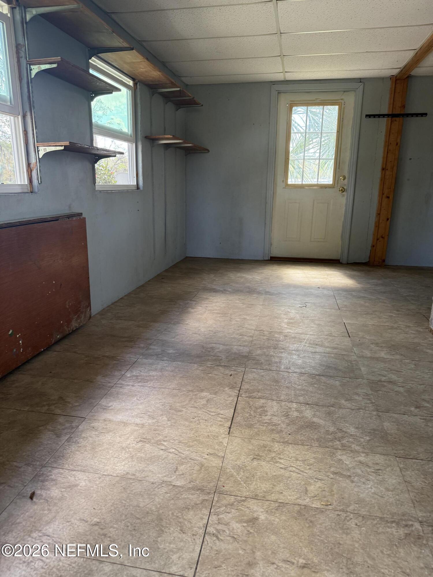 986 Highway 20 Interlachen, FL 32148 - Photo 32 of 53 an empty room with windows