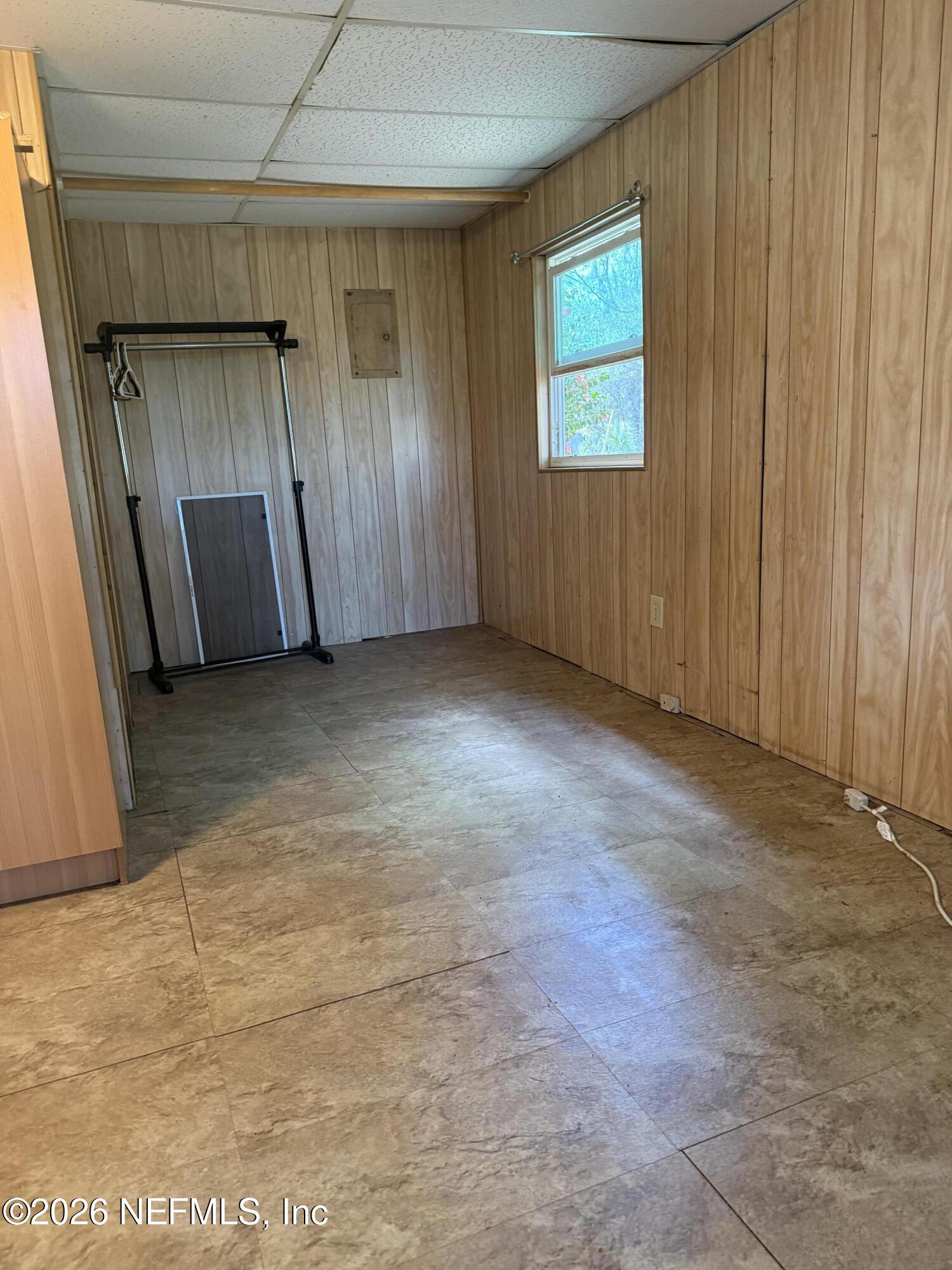 986 Highway 20 Interlachen, FL 32148 - Photo 34 of 53 an empty room with a window and refrigerator