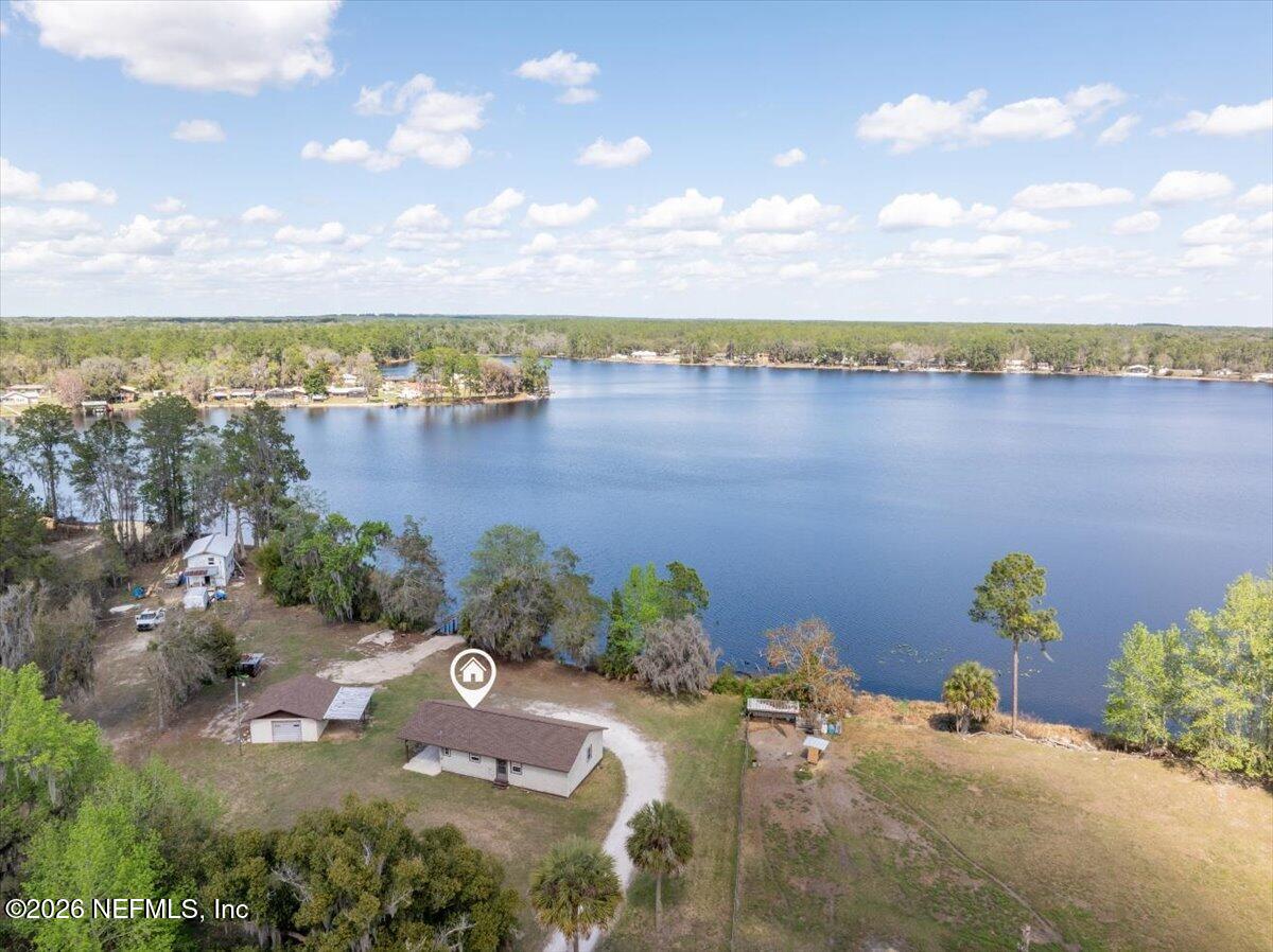 986 Highway 20 Interlachen, FL 32148 - Photo 48 of 53 a view of a lake with a building in the background