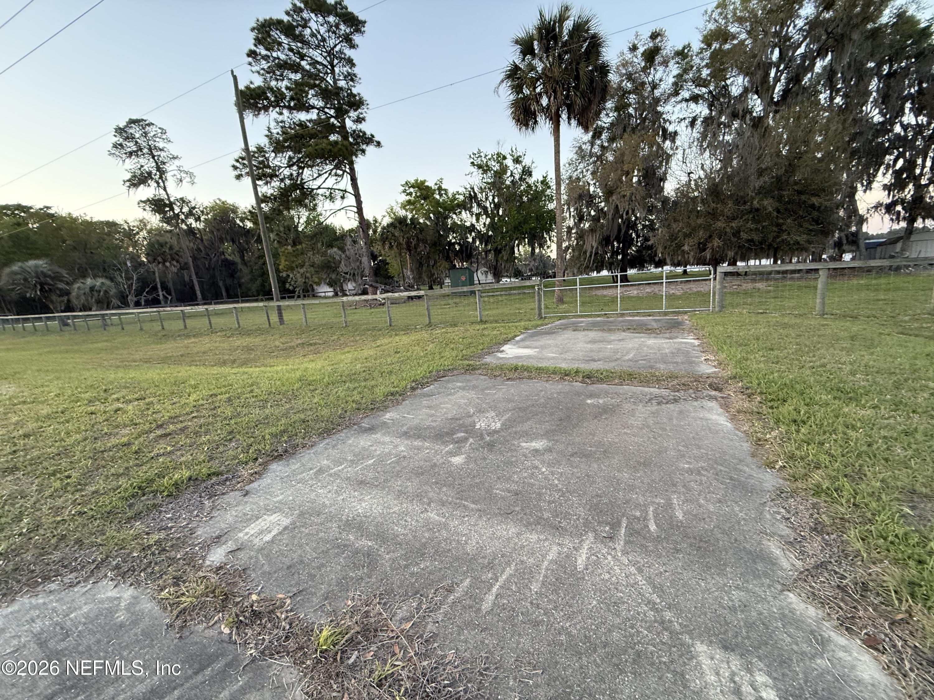 986 Highway 20 Interlachen, FL 32148 - Photo 52 of 53 a view of a golf course with a lake