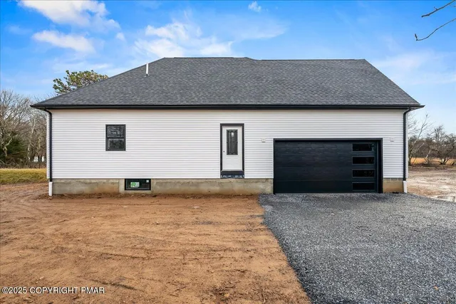 a front view of house with yard