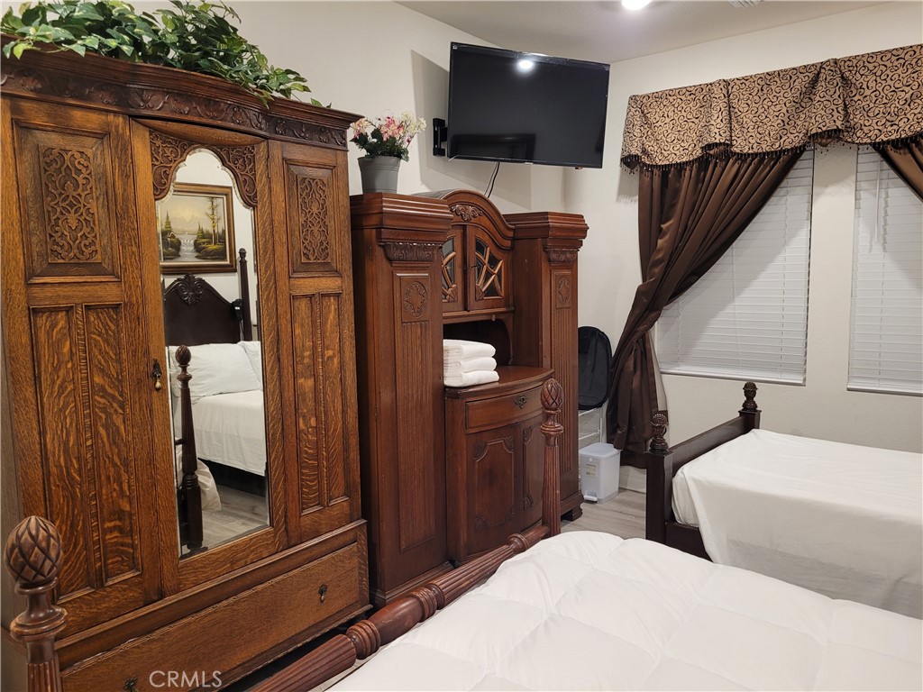 7561 Baerss Road Riverside, CA 92507 - Photo 13 of 27 a view of two windows and a television