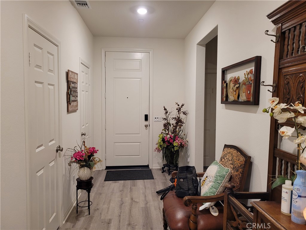 7561 Baerss Road Riverside, CA 92507 - Photo 22 of 27 a view of a entryway with furniture and livingroom