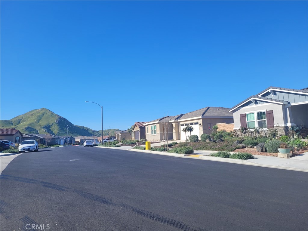 7561 Baerss Road Riverside, CA 92507 - Photo 26 of 27 a front view of a house with a yard