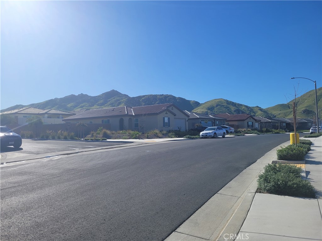 7561 Baerss Road Riverside, CA 92507 - Photo 27 of 27 a view of street and with car parked