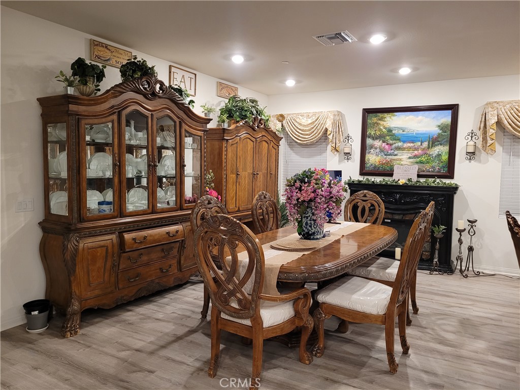 7561 Baerss Road Riverside, CA 92507 - Photo 6 of 27 a view of a dining room with furniture