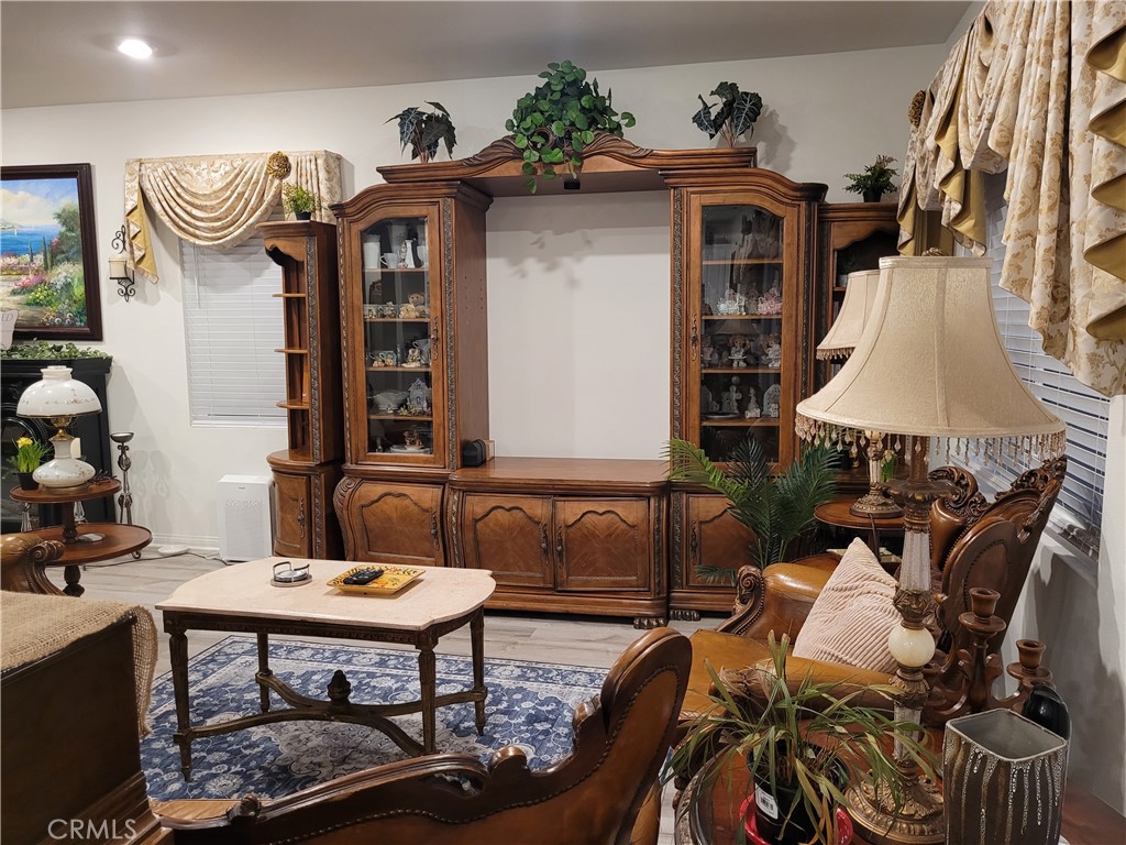 7561 Baerss Road Riverside, CA 92507 - Photo 8 of 27 a view of a dining room with furniture and a chandelier