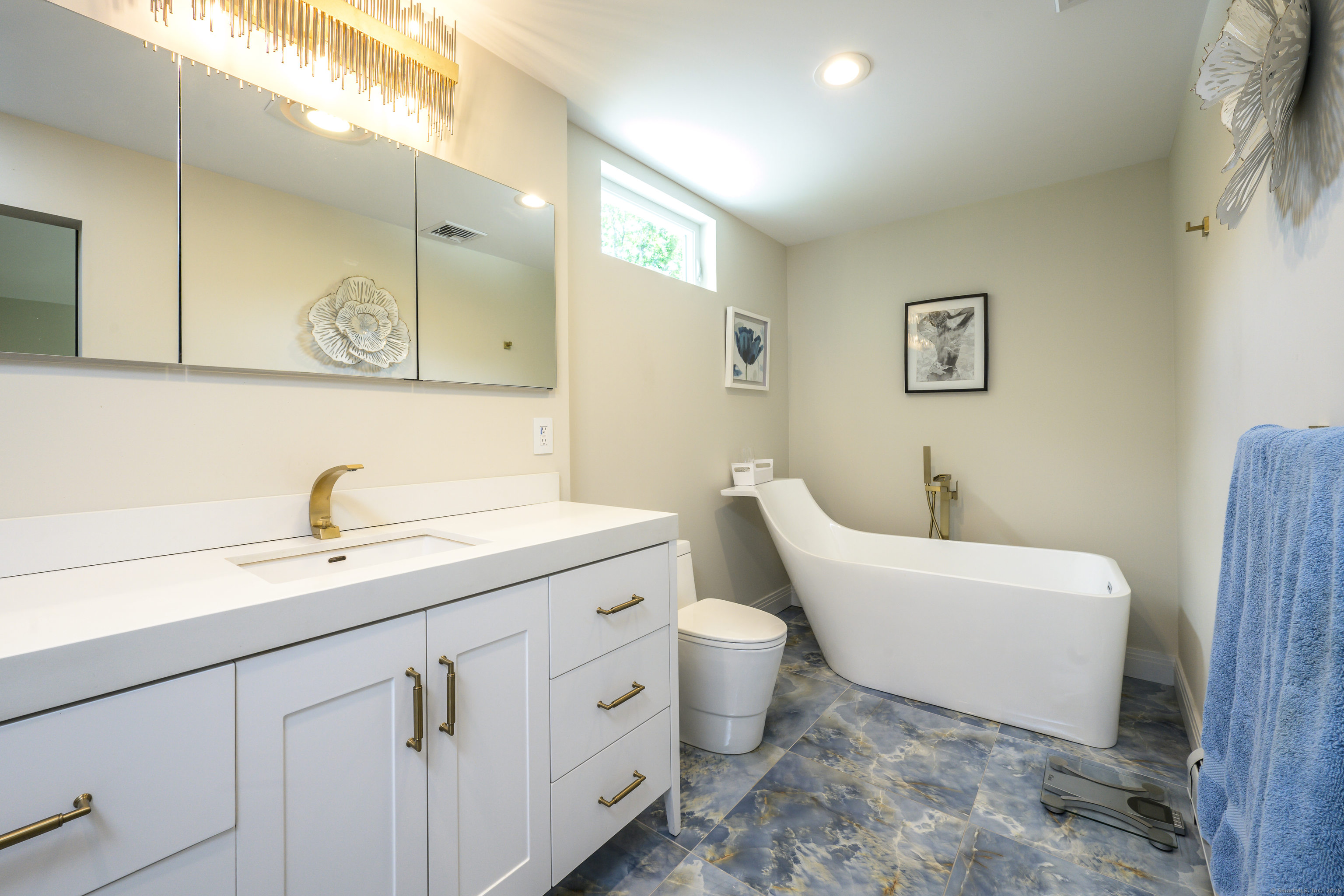 35 Kirk Road Sharon, CT 06796 - Photo 37 of 40 a bathroom with a toilet sink and mirror