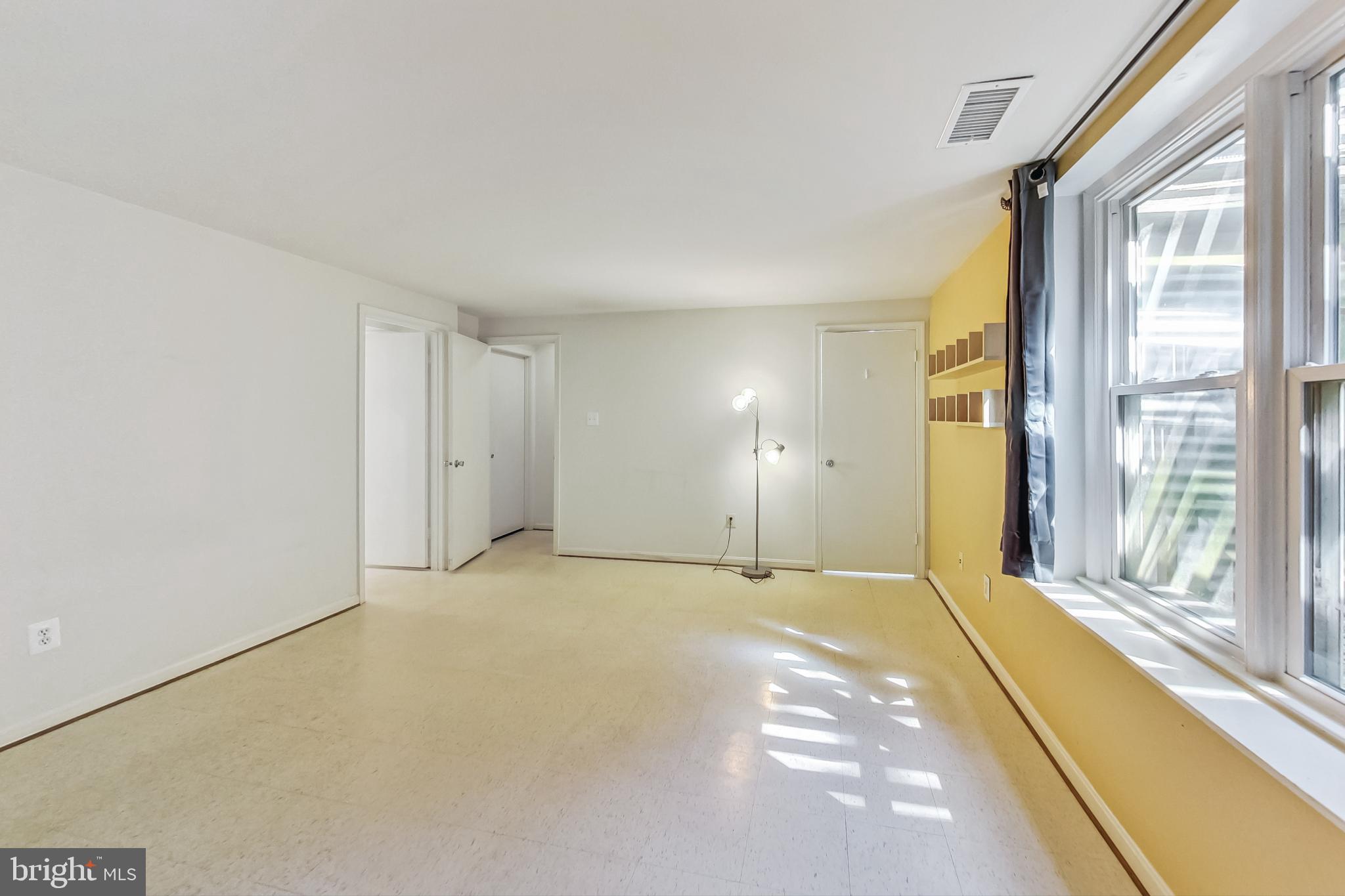 11924 Redtree Way Reston, VA 20194 - Photo 21 of 31 a view of an empty room with a window