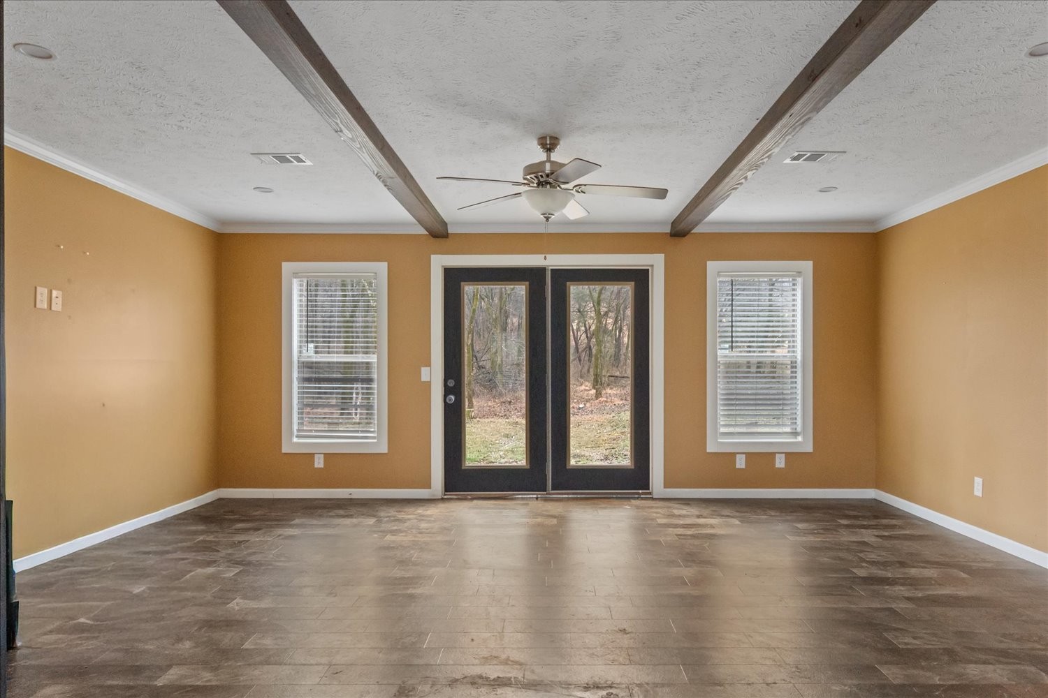 1189 Chicken Creek Road Pulaski, TN 38478 - Photo 11 of 30 a view of an empty room with a window and wooden floor