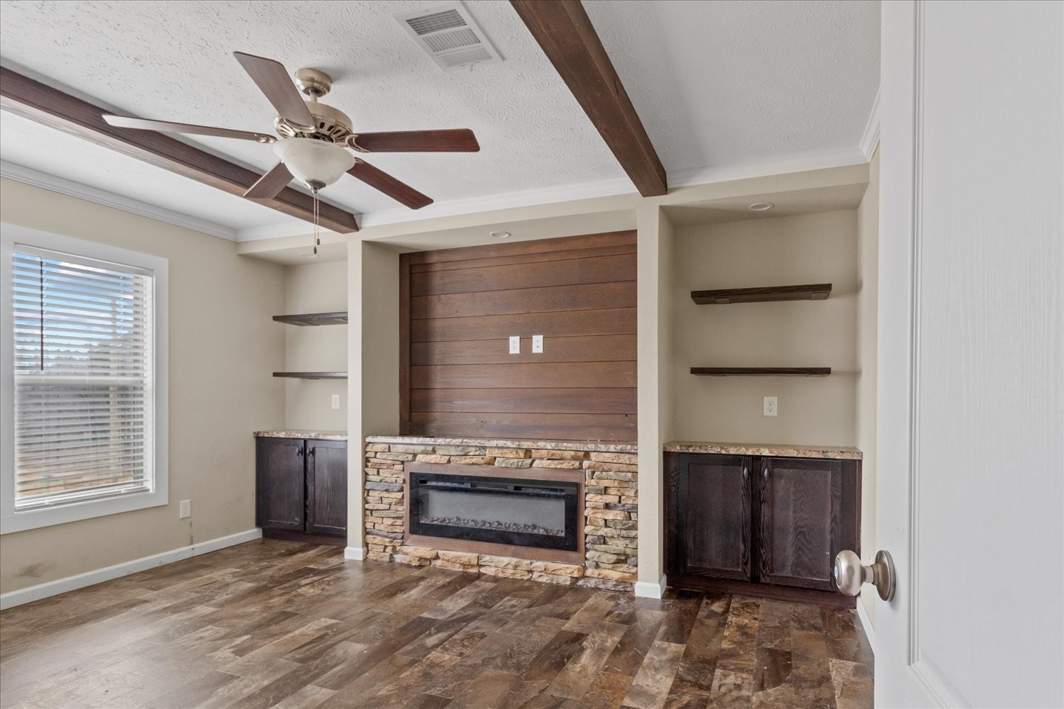 1189 Chicken Creek Road Pulaski, TN 38478 - Photo 24 of 30 a view of an empty room with a fireplace and a window