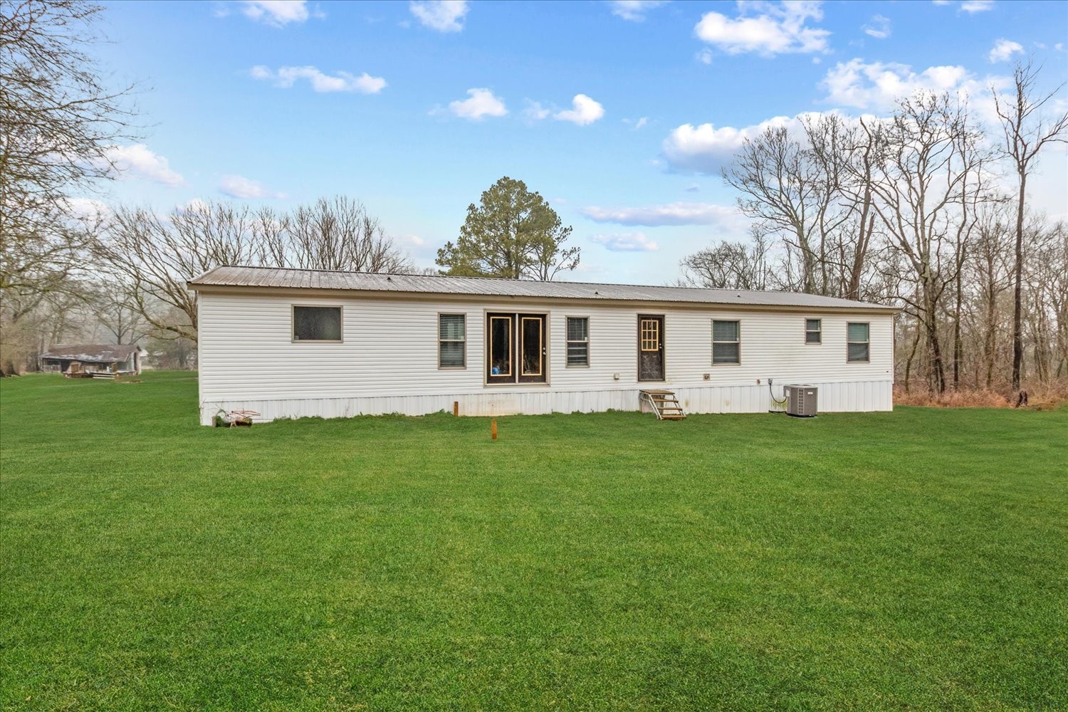 1189 Chicken Creek Road Pulaski, TN 38478 - Photo 27 of 30 a front view of a house with a garden