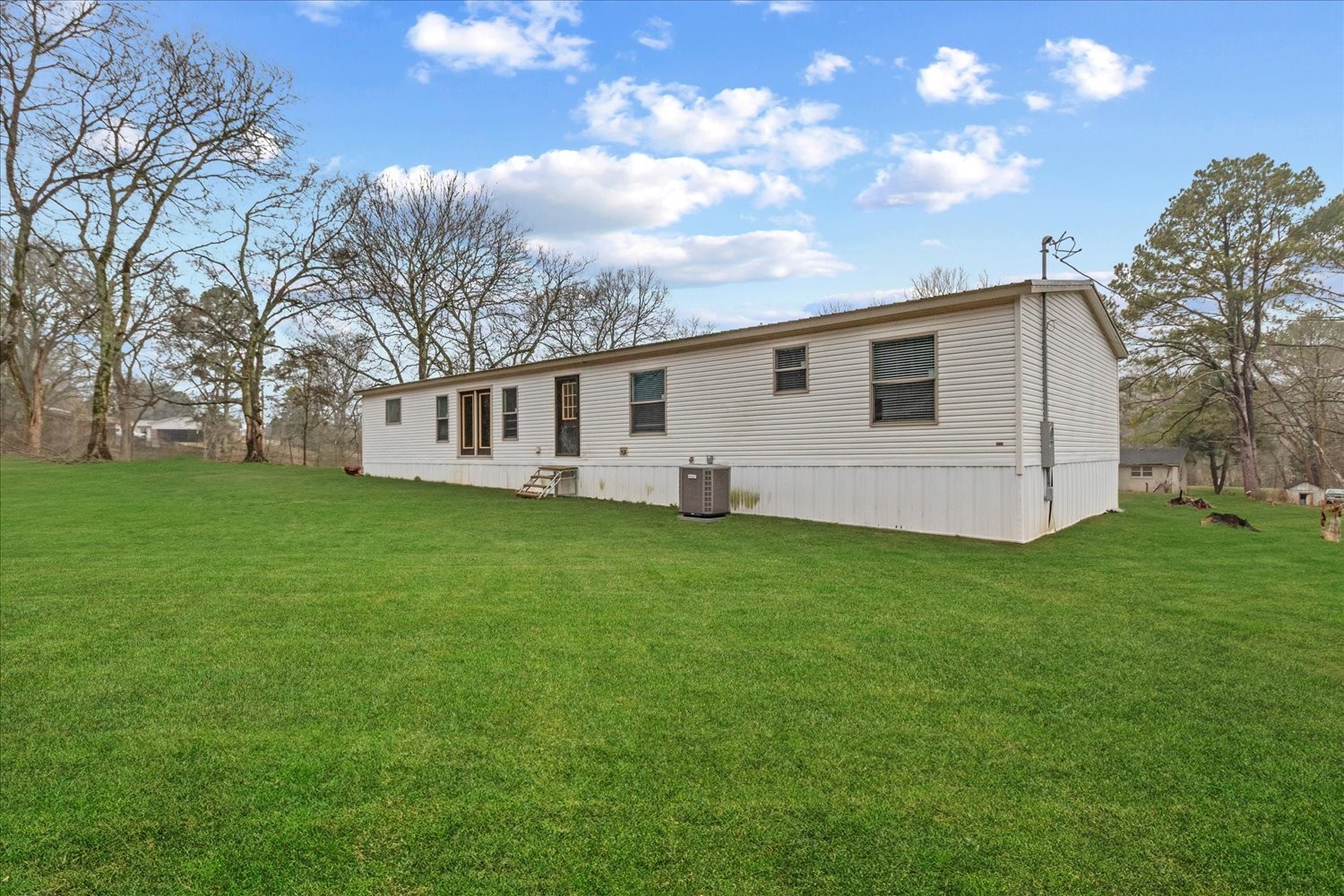 1189 Chicken Creek Road Pulaski, TN 38478 - Photo 29 of 30 a view of a house with a backyard