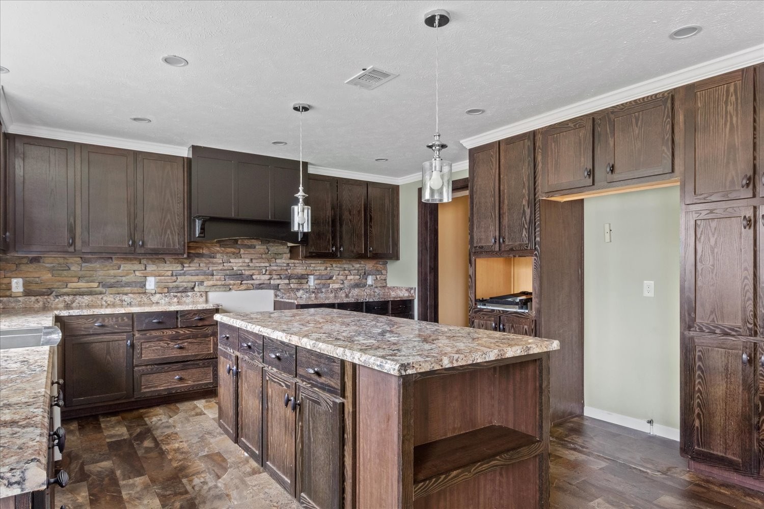 1189 Chicken Creek Road Pulaski, TN 38478 - Photo 8 of 30 a kitchen with a sink stove and refrigerator