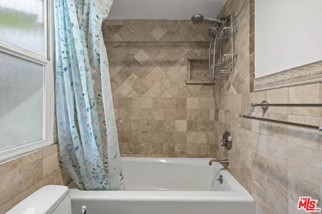 a bathroom with a bathtub
