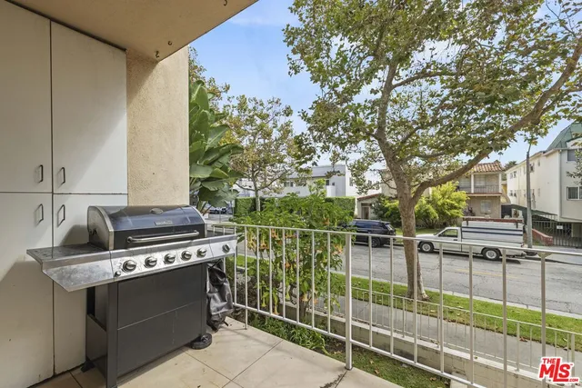 a view of a kitchen with seating area