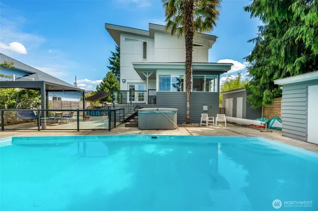 a front view of house with yard and outdoor seating