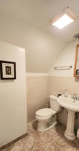 a view of a hallway with windows