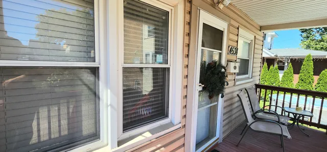 a view of a porch with a chair