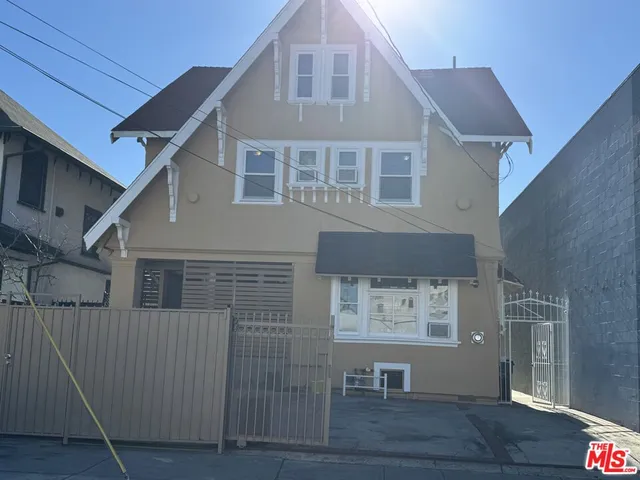 a front view of a house with glass windows